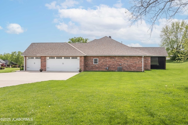 view of property exterior featuring concrete driveway, brick siding, a lawn, roof with shingles, and a garage