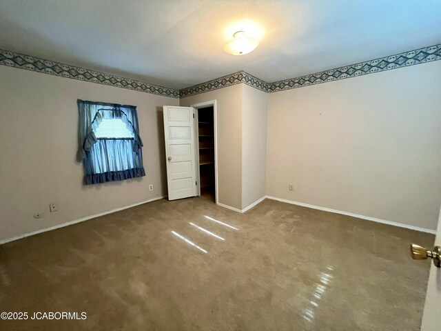 112 W 6th St, Fulton, MO 65251 - unfurnished bedroom with carpet and baseboards
