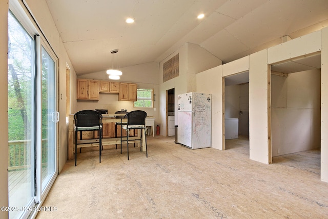 interior space featuring vaulted ceiling