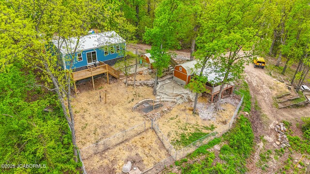 26792 Boone Rd, Barnett, MO 65011 - aerial view of property and surrounding area featuring a heavily wooded area