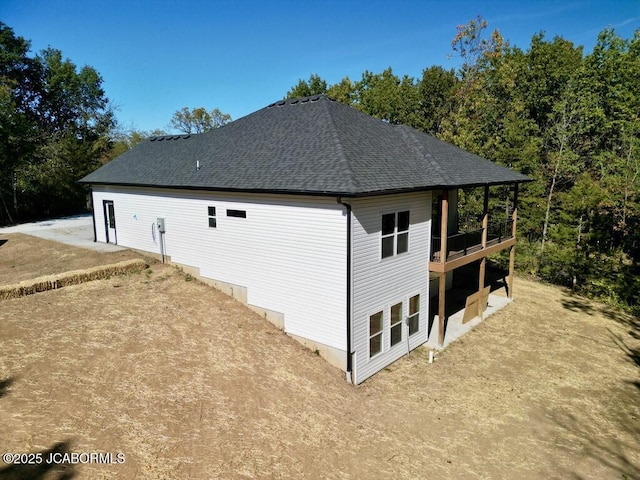1680 W Fenton Rd, Columbia, MO 65202 - view of side of property featuring roof with shingles