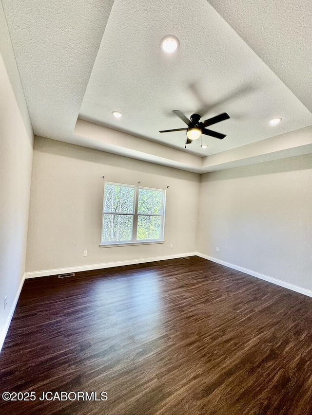 1680 W Fenton Rd, Columbia, MO 65202 - unfurnished room featuring recessed lighting, ceiling fan, baseboards, a textured ceiling, and wood finished floors