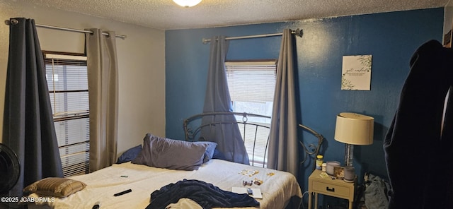 bedroom with a textured ceiling