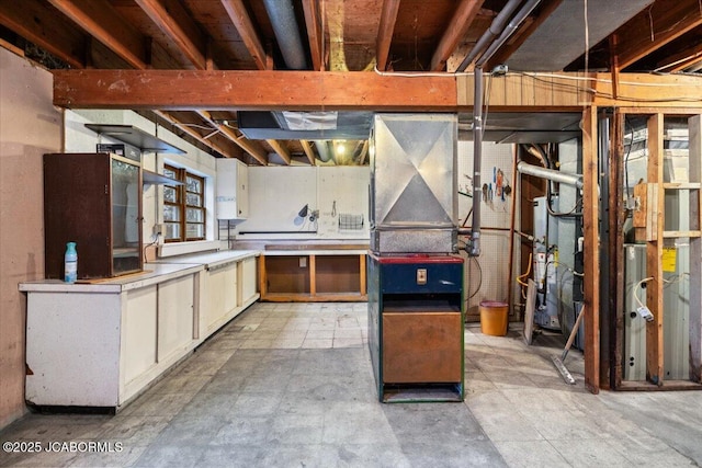 basement featuring heating unit