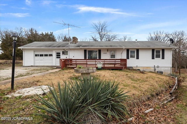 ranch-style home with a garage