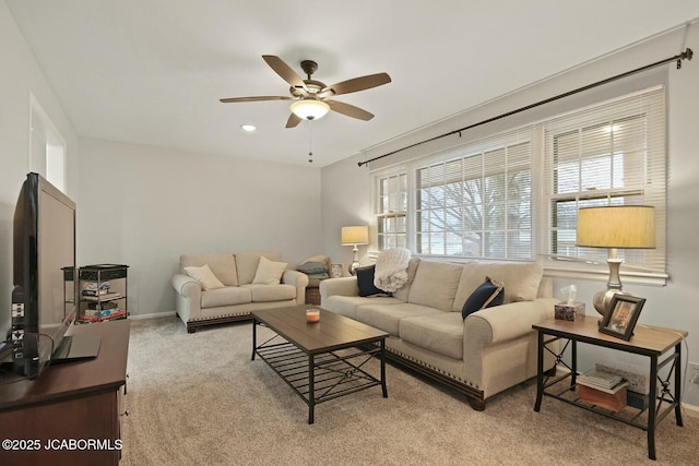 carpeted living room featuring recessed lighting, baseboards, and ceiling fan