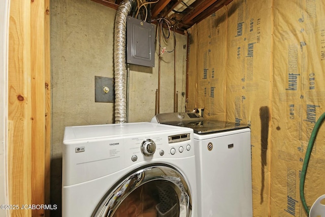 washroom with laundry area, electric panel, and separate washer and dryer