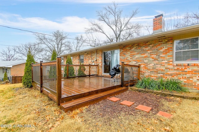 wooden deck featuring fence