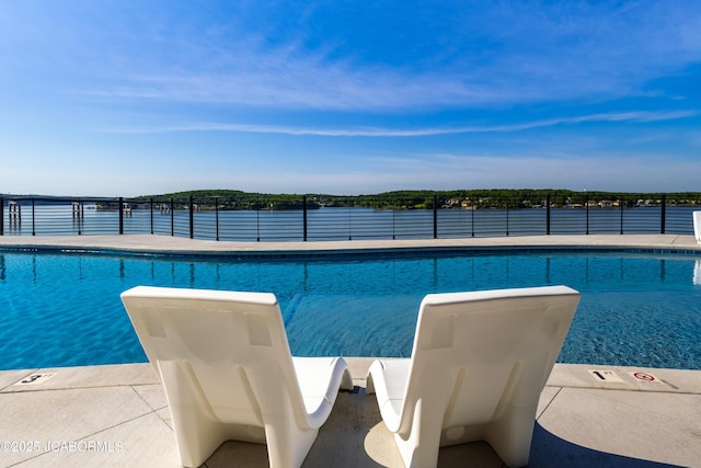 100 Blue Heron Hill Ln Unit 103, Lake Ozark, MO 65049 - view of pool featuring a water view