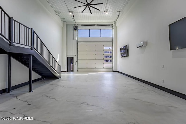 100 Blue Heron Hill Ln Unit 103, Lake Ozark, MO 65049 - garage featuring baseboards