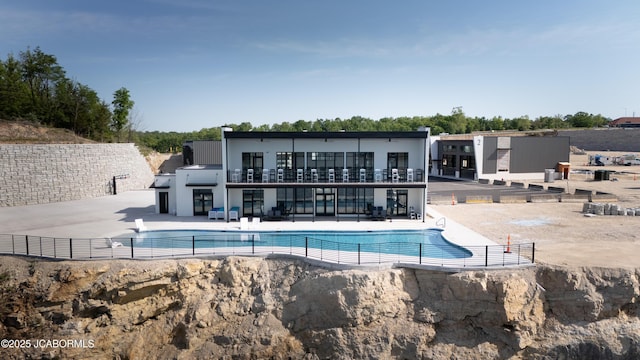 100 Blue Heron Hill Ln Unit 103, Lake Ozark, MO 65049 - view of swimming pool featuring a patio area