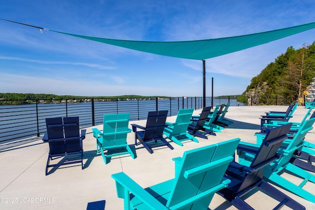 100 Blue Heron Hill Ln Unit 103, Lake Ozark, MO 65049 - view of patio with a water view