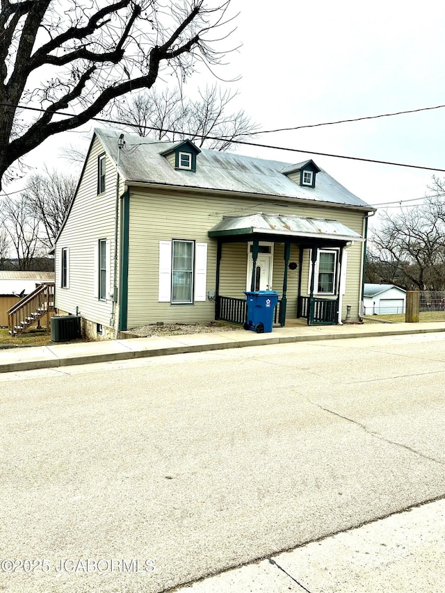 view of front of property with central AC unit