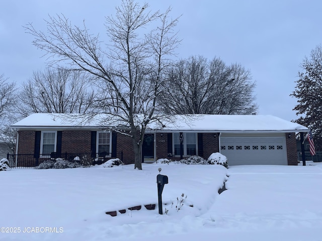 single story home with a garage