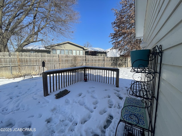 view of snow covered deck