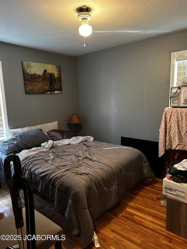 618 E Jefferson St, Linn, MO 65051 - bedroom featuring wood finished floors