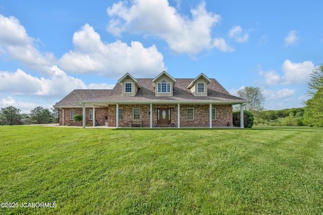 8703 Old Stage Rd, Jefferson City, MO 65109 - view of front of home featuring a front yard, brick siding, and a shingled roof