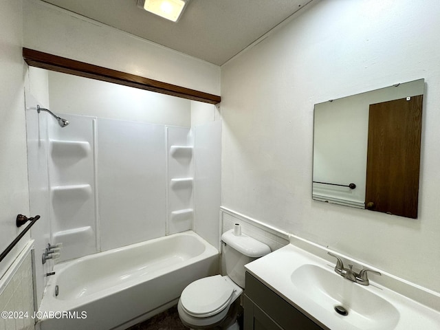 full bathroom featuring shower / washtub combination, vanity, and toilet