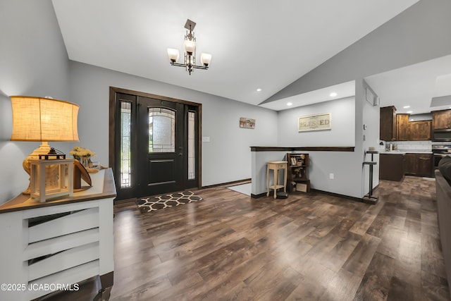 11169 Ridge Fork Dr, Holts Summit, MO 65043 - entryway featuring vaulted ceiling, a chandelier, dark wood-type flooring, and recessed lighting