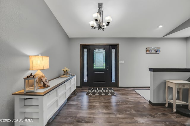 11169 Ridge Fork Dr, Holts Summit, MO 65043 - entryway with vaulted ceiling, dark wood-style floors, a chandelier, and recessed lighting