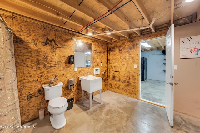 11169 Ridge Fork Dr, Holts Summit, MO 65043 - bathroom featuring unfinished concrete flooring and toilet
