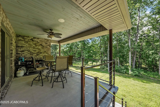 11169 Ridge Fork Dr, Holts Summit, MO 65043 - view of patio / terrace with outdoor dining area and a ceiling fan
