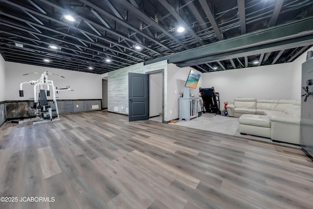 11169 Ridge Fork Dr, Holts Summit, MO 65043 - finished below grade area with wood finished floors and wainscoting