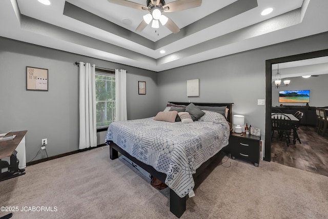 11169 Ridge Fork Dr, Holts Summit, MO 65043 - bedroom with carpet flooring, a tray ceiling, and recessed lighting