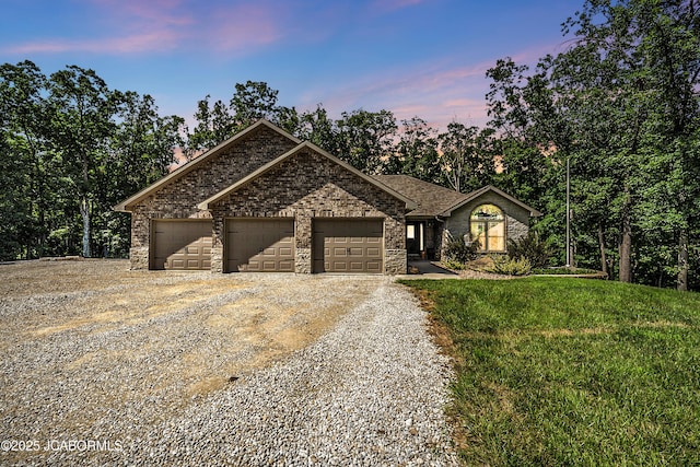 11169 Ridge Fork Dr, Holts Summit, MO 65043 - ranch-style house featuring driveway, a garage, and brick siding