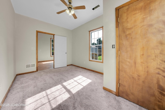 822 Center St, Fulton, MO 65251 - unfurnished bedroom featuring carpet and ceiling fan