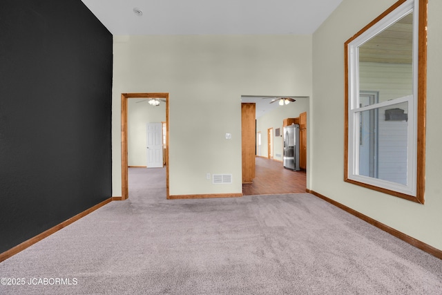 822 Center St, Fulton, MO 65251 - carpeted empty room with ceiling fan and baseboards