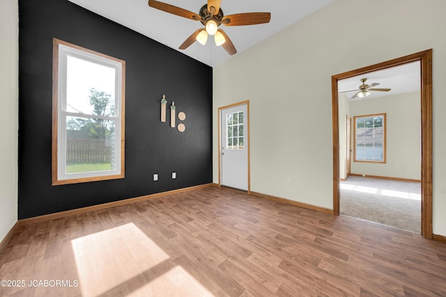 822 Center St, Fulton, MO 65251 - spare room with ceiling fan, light wood-type flooring, plenty of natural light, and vaulted ceiling