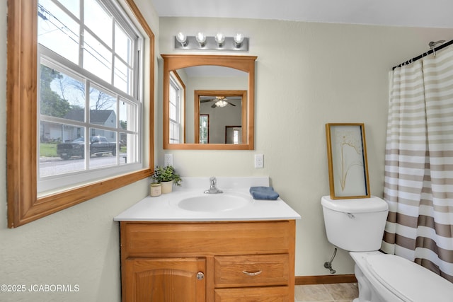 822 Center St, Fulton, MO 65251 - bathroom featuring vanity, a ceiling fan, and curtained shower