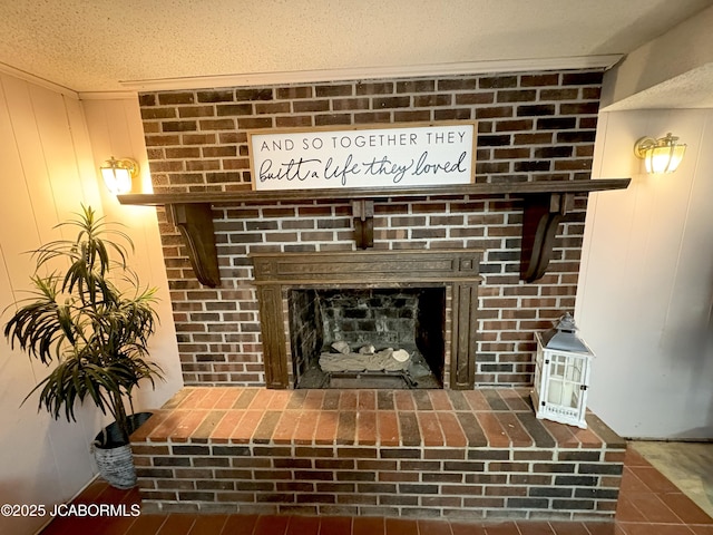 interior details featuring a textured ceiling and a fireplace