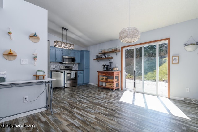 kitchen with blue cabinets, dark wood-style floors, tasteful backsplash, and stainless steel appliances