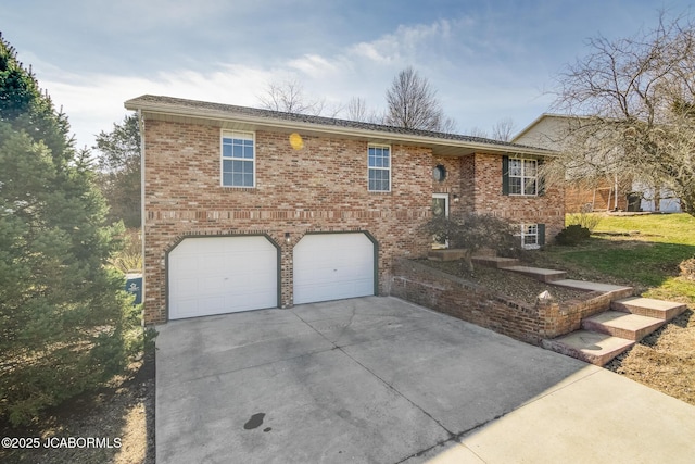 view of front of home with concrete driveway, brick siding, and an attached garage