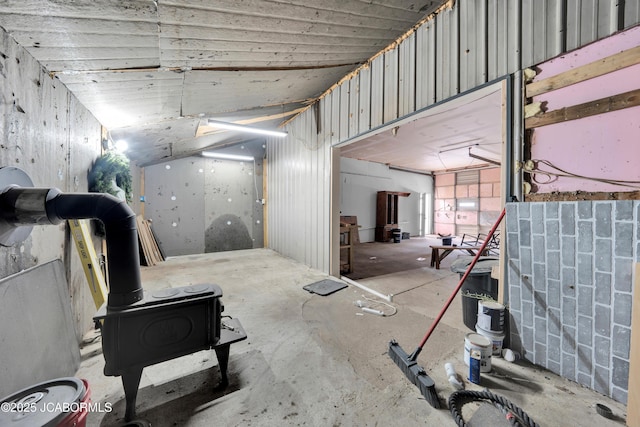 53036 Bird Haven Rd, Centertown, MO 65023 - garage featuring a wood stove
