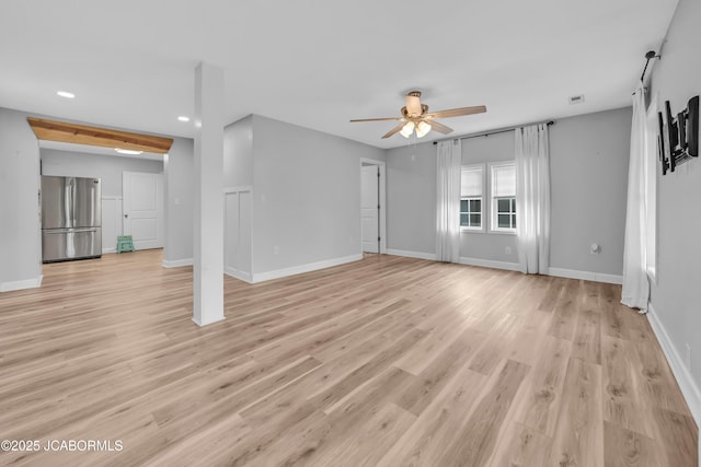 53036 Bird Haven Rd, Centertown, MO 65023 - unfurnished living room featuring a ceiling fan, recessed lighting, and light wood-style flooring