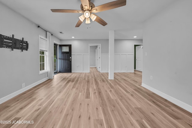 53036 Bird Haven Rd, Centertown, MO 65023 - unfurnished living room featuring a ceiling fan, light wood-type flooring, and recessed lighting