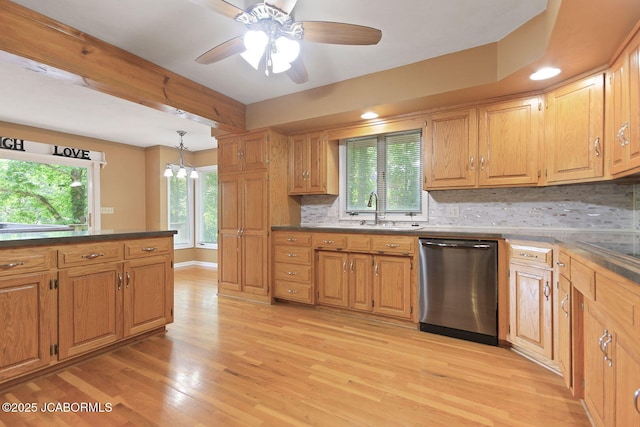 907 Primrose Ln, Jefferson City, MO 65109 - kitchen with stainless steel dishwasher, light wood-type flooring, a chandelier, decorative backsplash, and ceiling fan