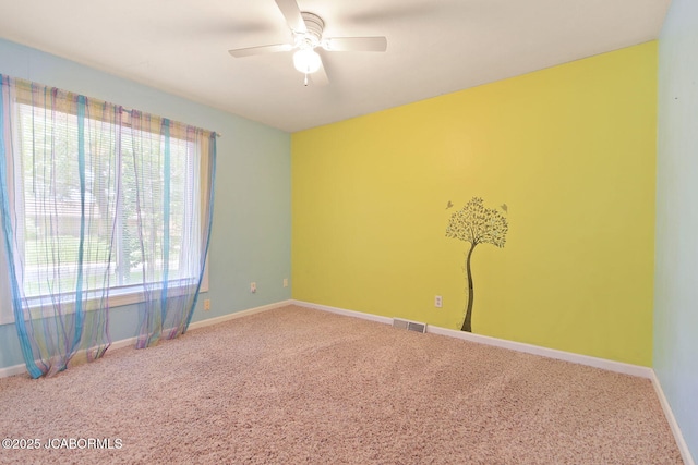 907 Primrose Ln, Jefferson City, MO 65109 - carpeted empty room with ceiling fan and baseboards