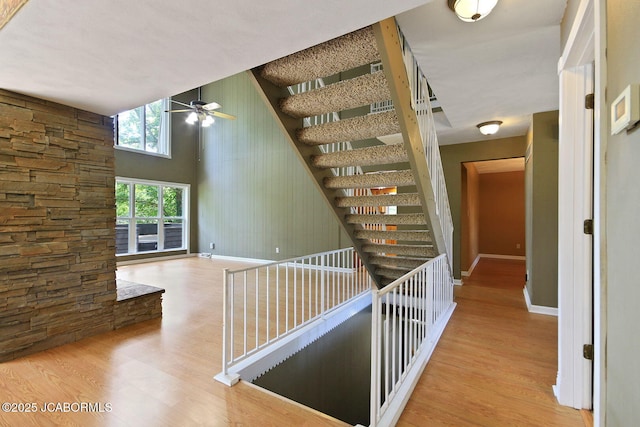 907 Primrose Ln, Jefferson City, MO 65109 - hall featuring wood finished floors and an upstairs landing