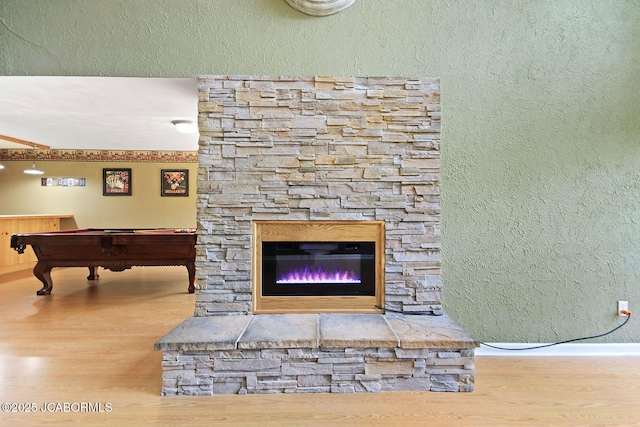 907 Primrose Ln, Jefferson City, MO 65109 - detailed view of wood finished floors, billiards, and a fireplace