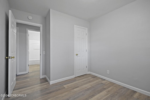 unfurnished room featuring light wood-type flooring