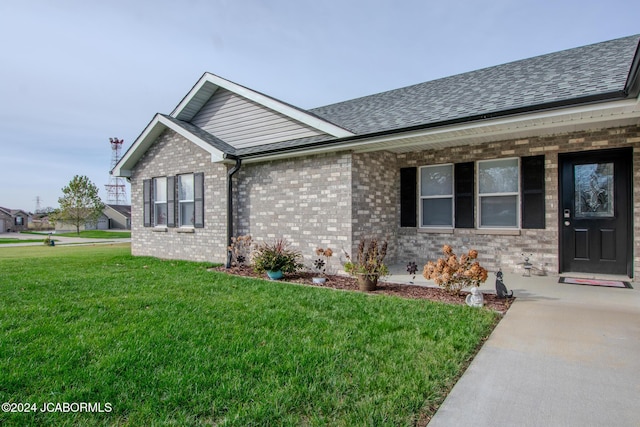 ranch-style house with a front yard