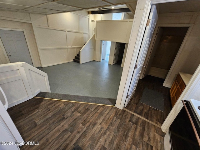 stairway featuring hardwood / wood-style floors