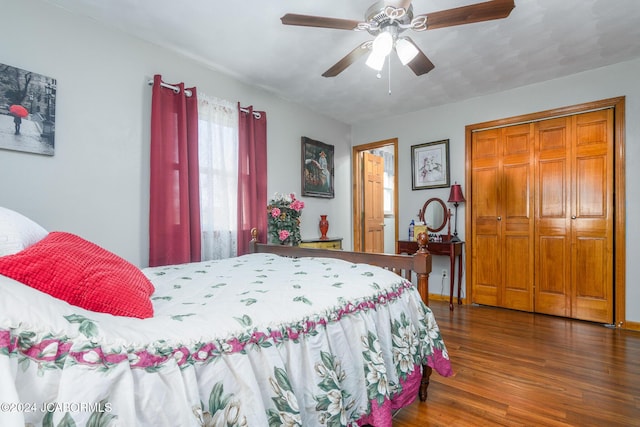 bedroom featuring dark hardwood / wood-style flooring, ceiling fan, a closet, and a textured ceiling