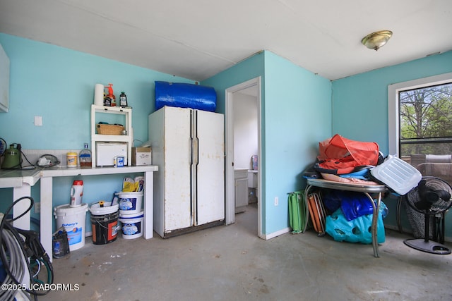 interior space with freestanding refrigerator