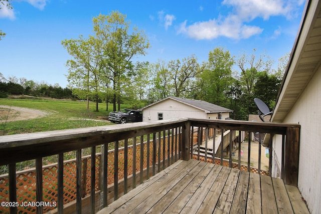deck featuring a lawn