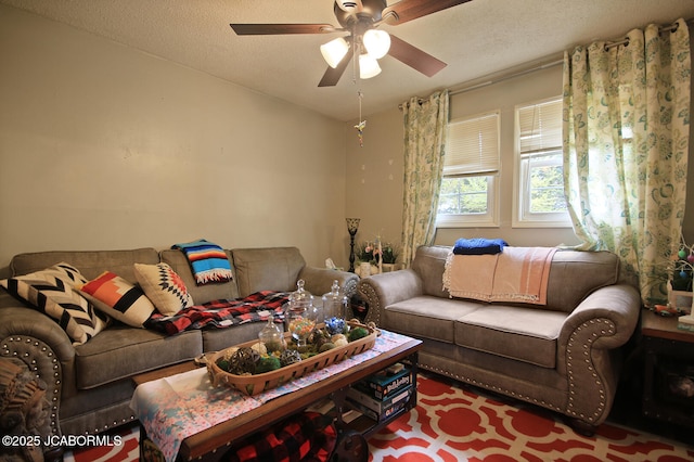 7519 Stringtown Station Rd, Lohman, MO 65053 - living room featuring a ceiling fan and a textured ceiling